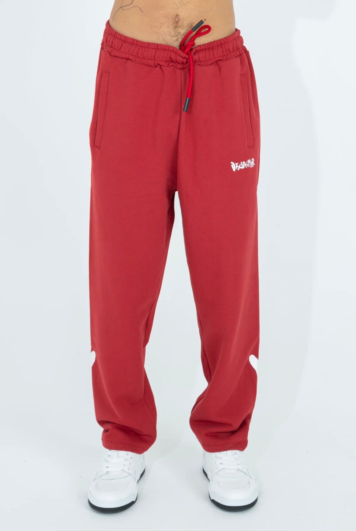 PANTALONE TUTA CON DETTAGLI LATERALI DISCLAIMER